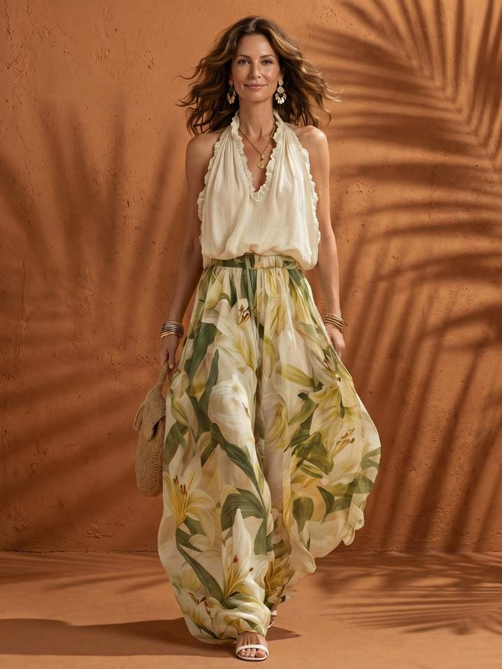 Solange | Souprava s halter halenkou a florálními širokými kalhotami